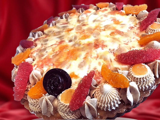 Une délicieuse tarte à la pâte sablée amandes, aux agrumes litchi, le tout agrémentée d'une ganache namelaka au chocolat blanc