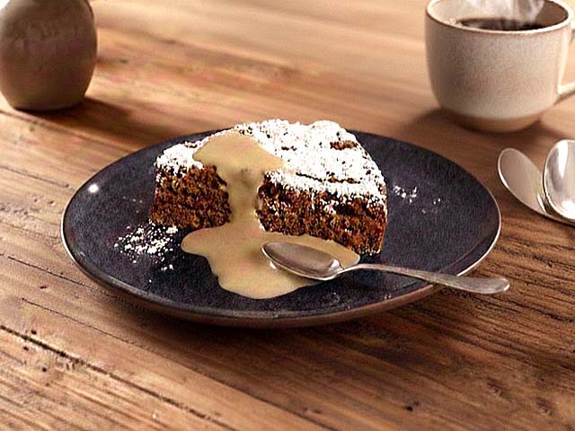 Gâteau namandier aux amandes et chocolat fondant, moelleux et gourmand, présenté sur une assiette, avec praliné amandes noisettes maison 